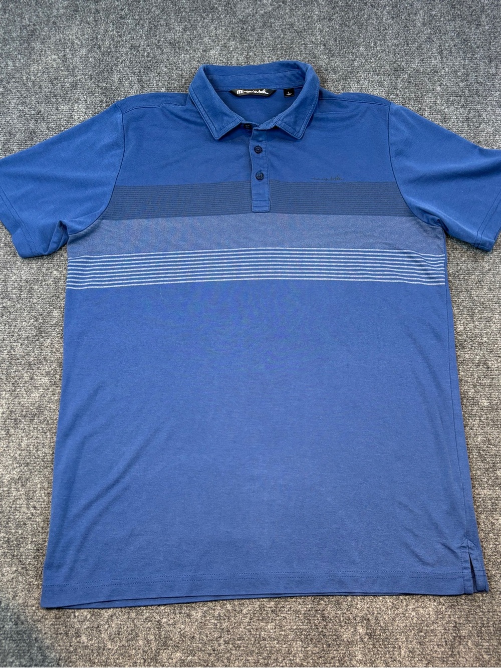 TravisMathew "Late Checkout"polo blue design horizontal chest stripes size L
